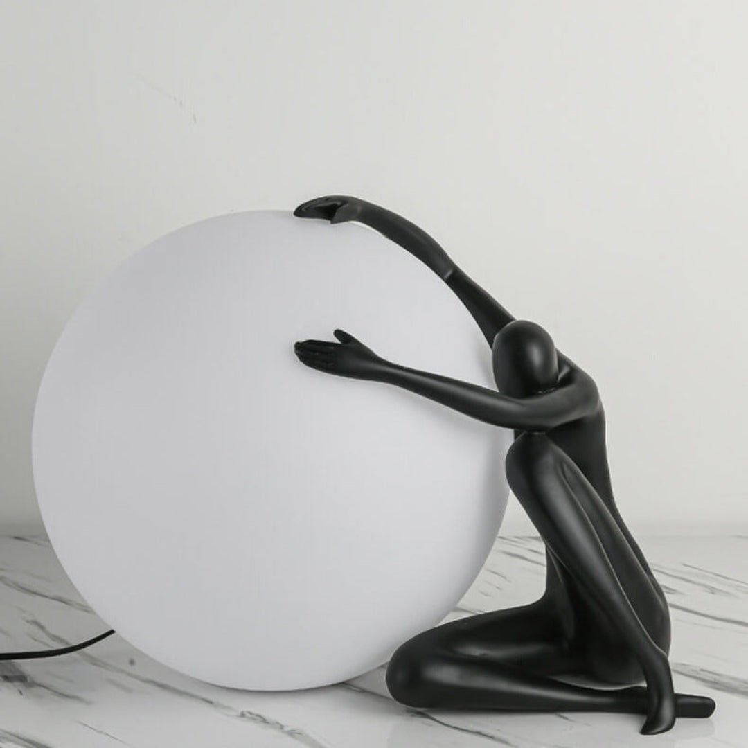 Cosmo Humanoid Ball Holding Lampa Stołowa