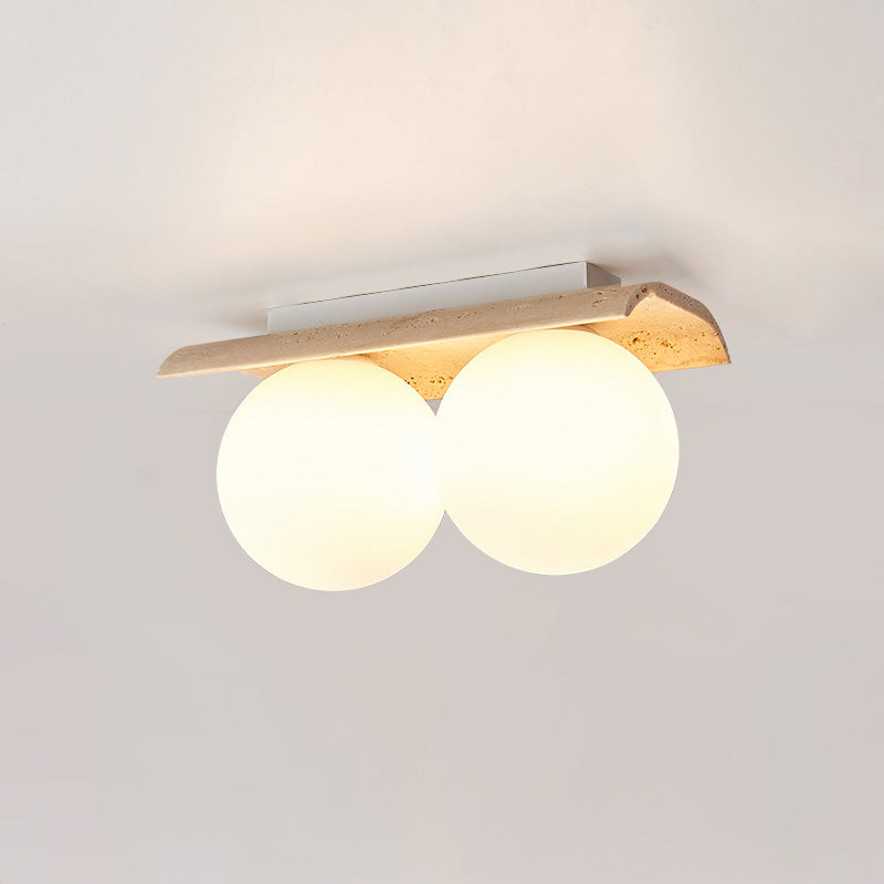 Serenaya kulista lampa sufitowa ze szkła i travertinu