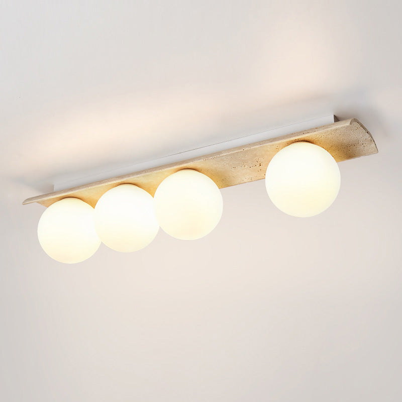 Serenaya kulista lampa sufitowa ze szkła i travertinu