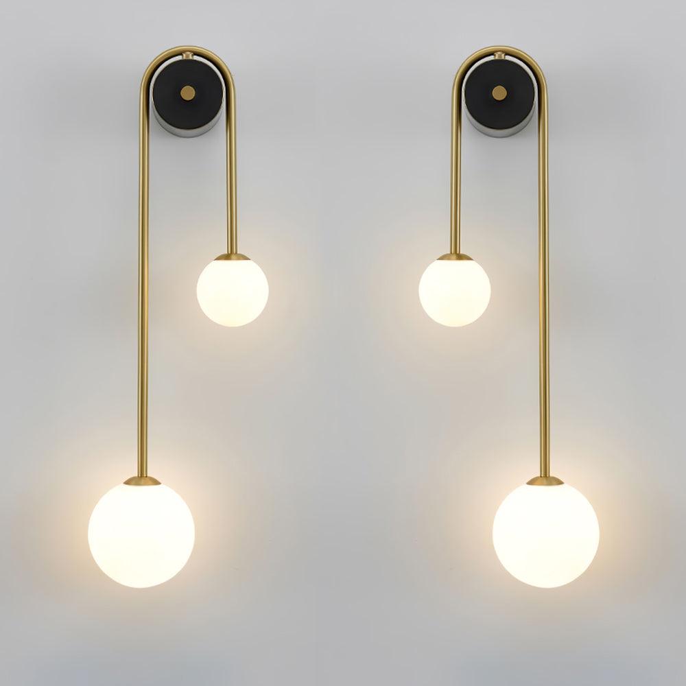 Elaro mosiężna lampa ścienna z łukowatą ramą