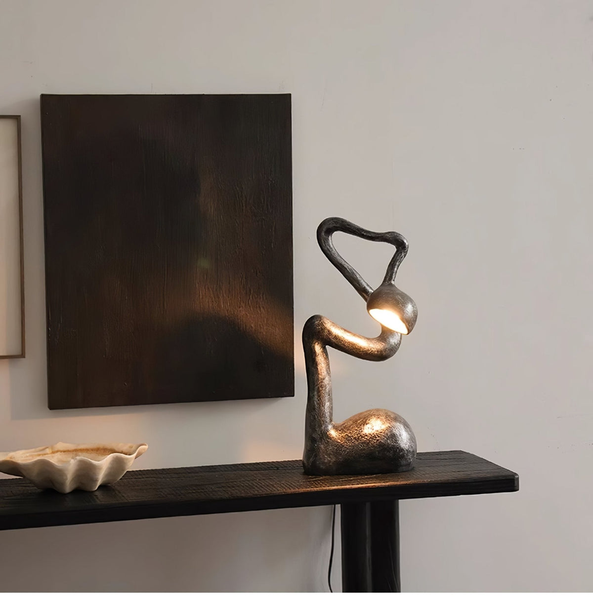 Twist czarna lampa stołowa o charakterze rzeźby