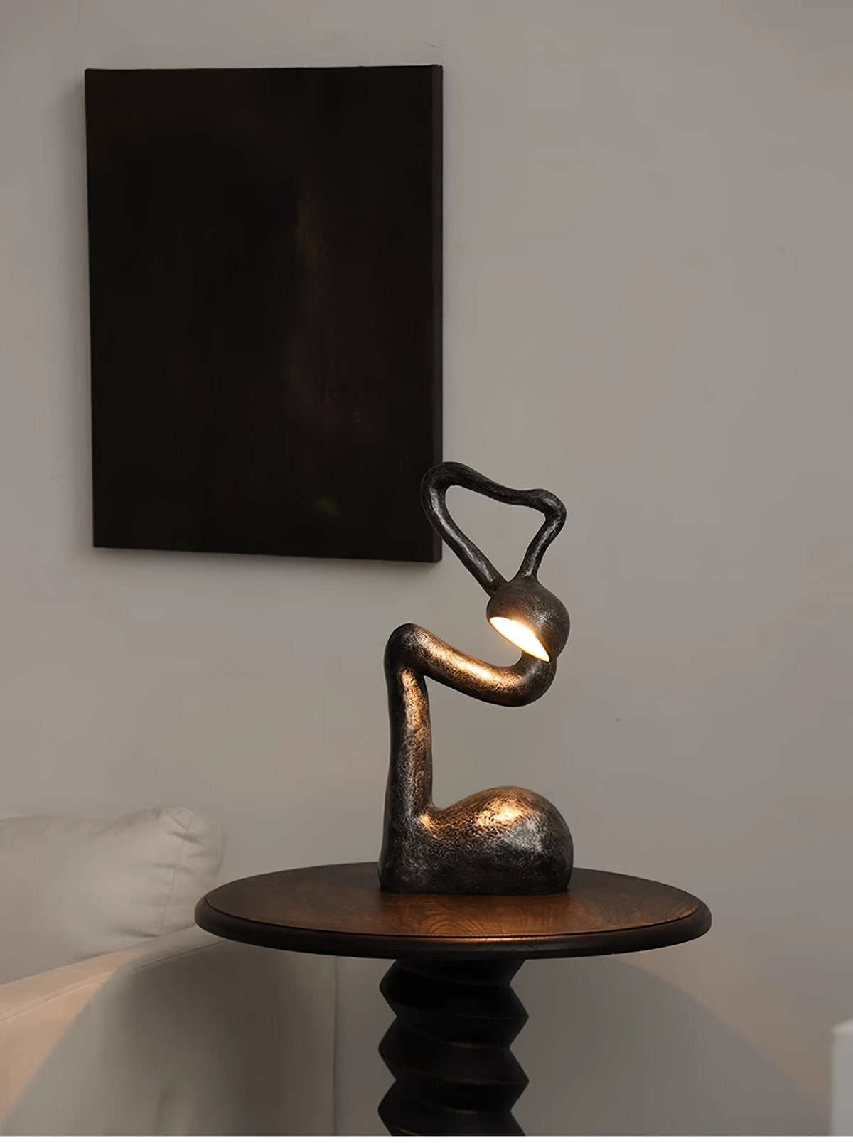 Twist czarna lampa stołowa o charakterze rzeźby