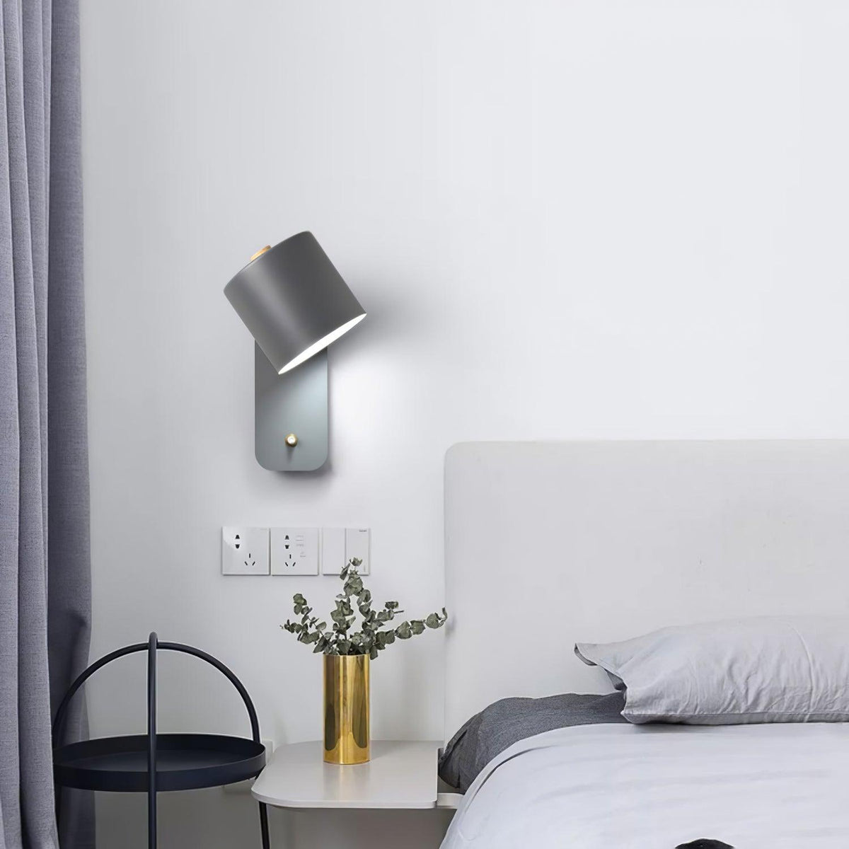 Quella regulowana lampa ścienna w kształcie cylindra