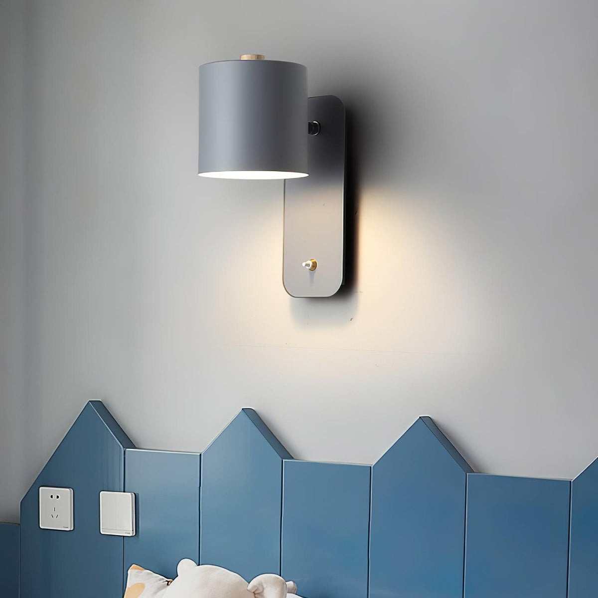 Quella regulowana lampa ścienna w kształcie cylindra