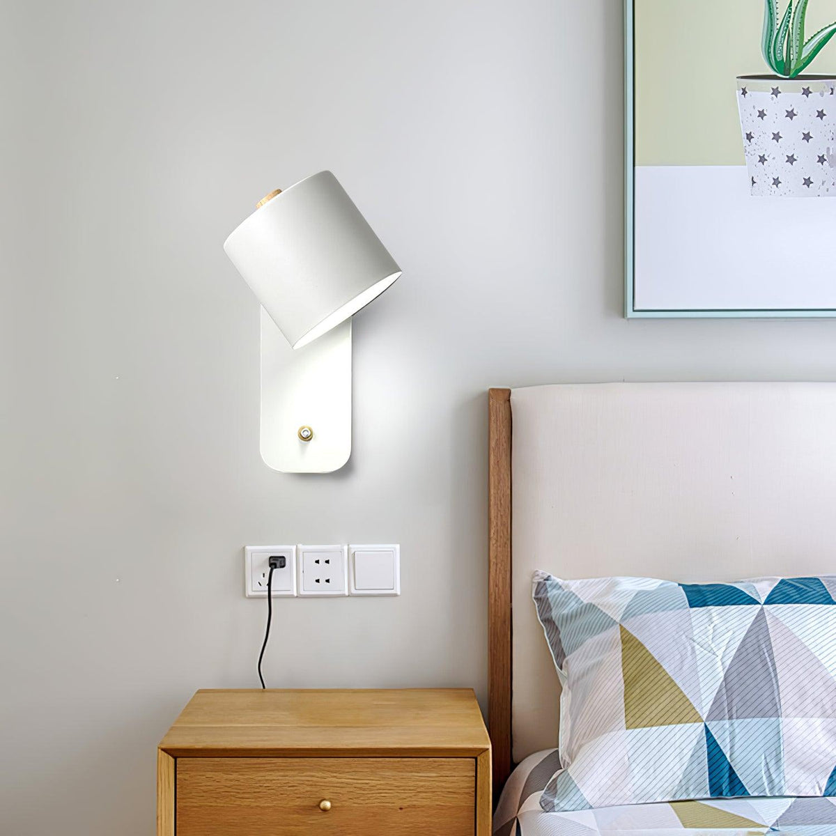 Quella regulowana lampa ścienna w kształcie cylindra