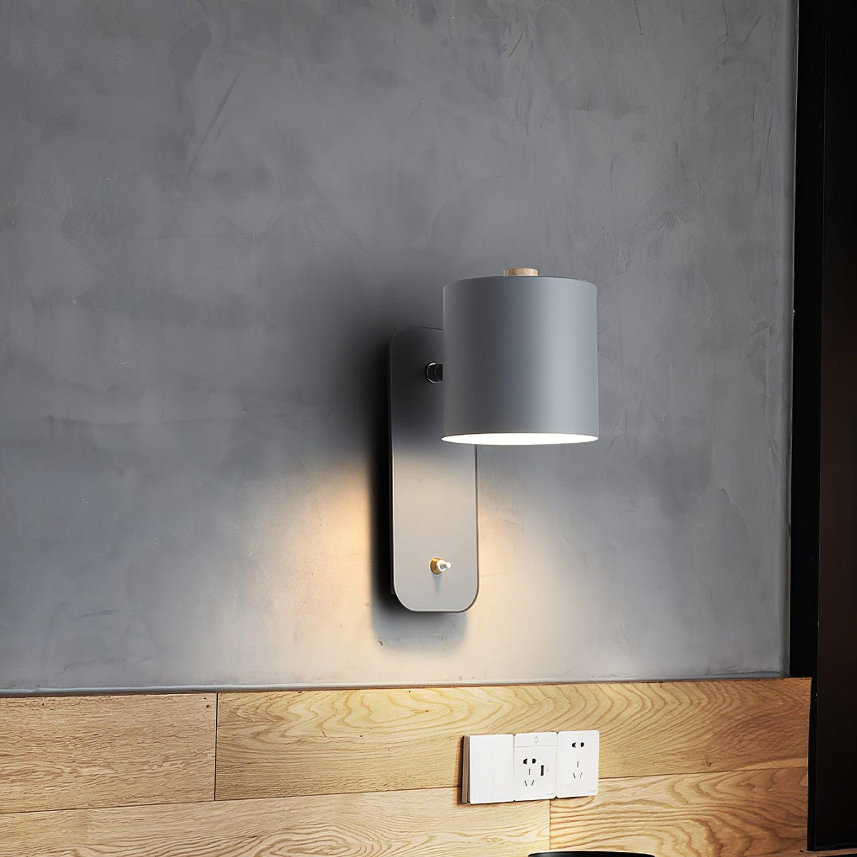 Quella regulowana lampa ścienna w kształcie cylindra
