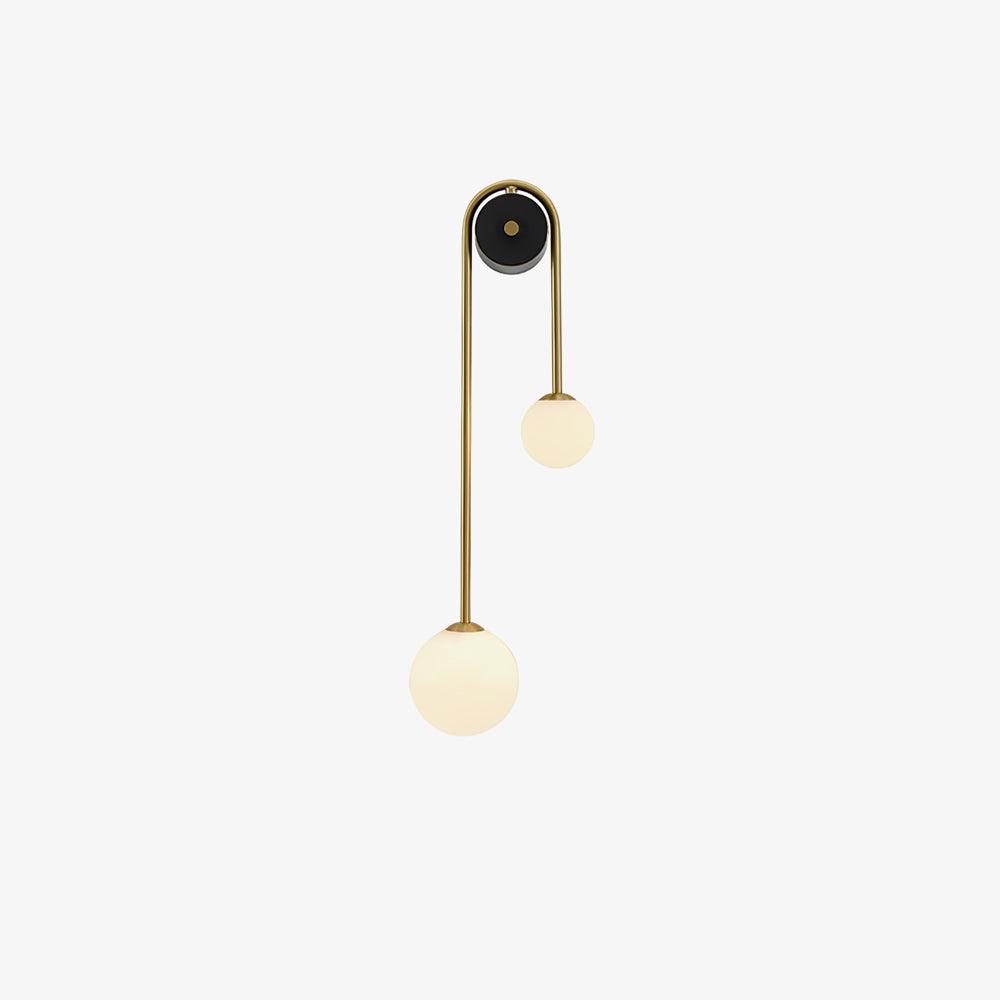 Elaro mosiężna lampa ścienna z łukowatą ramą