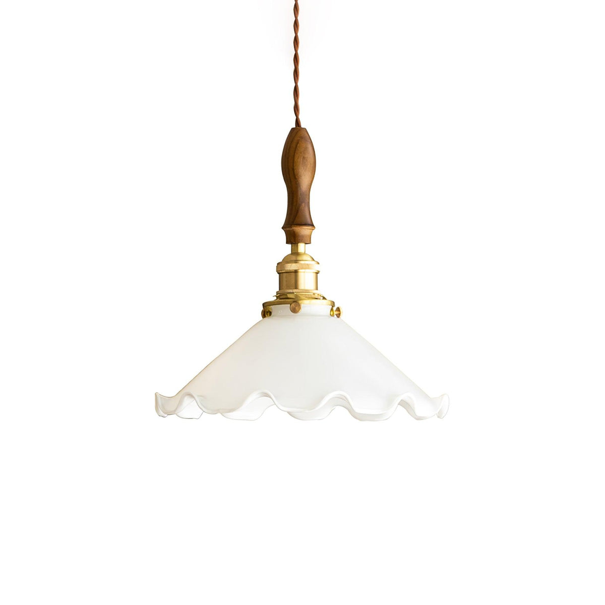 Questa lampa wisząca ze szkła o falistym kloszu w stylu vintage dla salonu