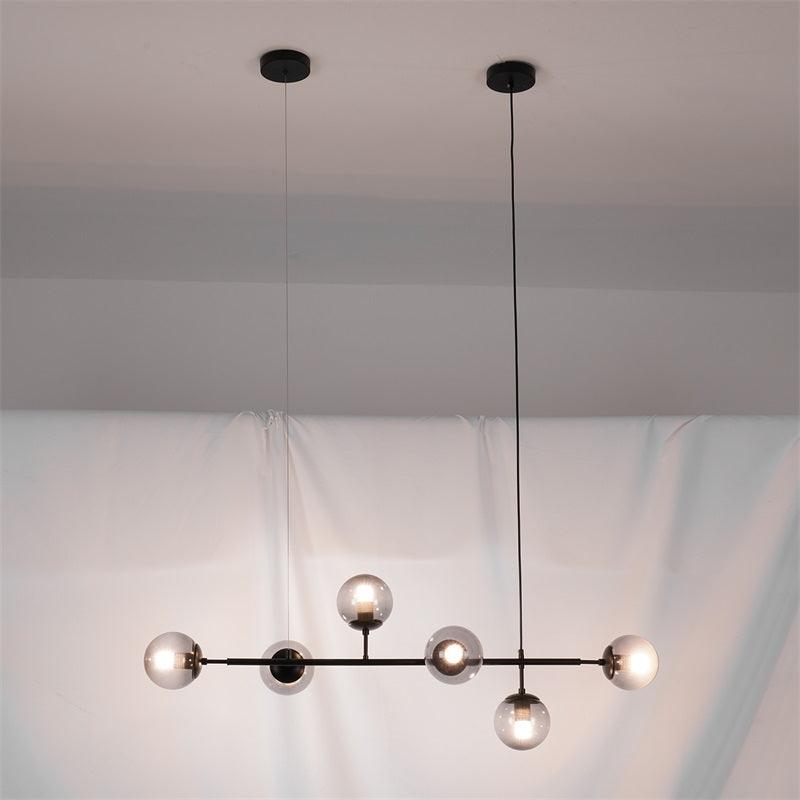 Valentina Industrial długoliniowa metalowa wisząca kula wielopunktowa z przezroczystą żarówką do sypialni lampa wisząca mosiądz/czarny