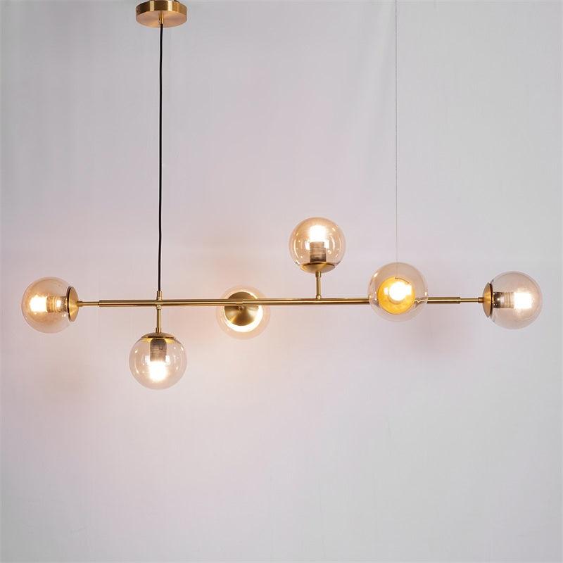 Valentina Industrial długoliniowa metalowa wisząca kula wielopunktowa z przezroczystą żarówką do sypialni lampa wisząca mosiądz/czarny