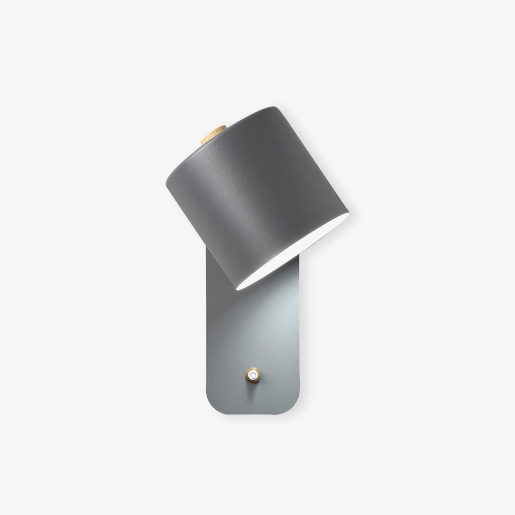 Quella regulowana lampa ścienna w kształcie cylindra