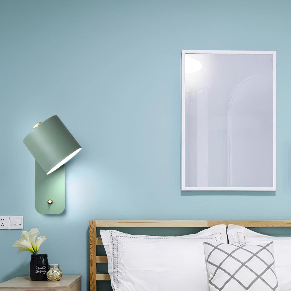 Quella regulowana lampa ścienna w kształcie cylindra
