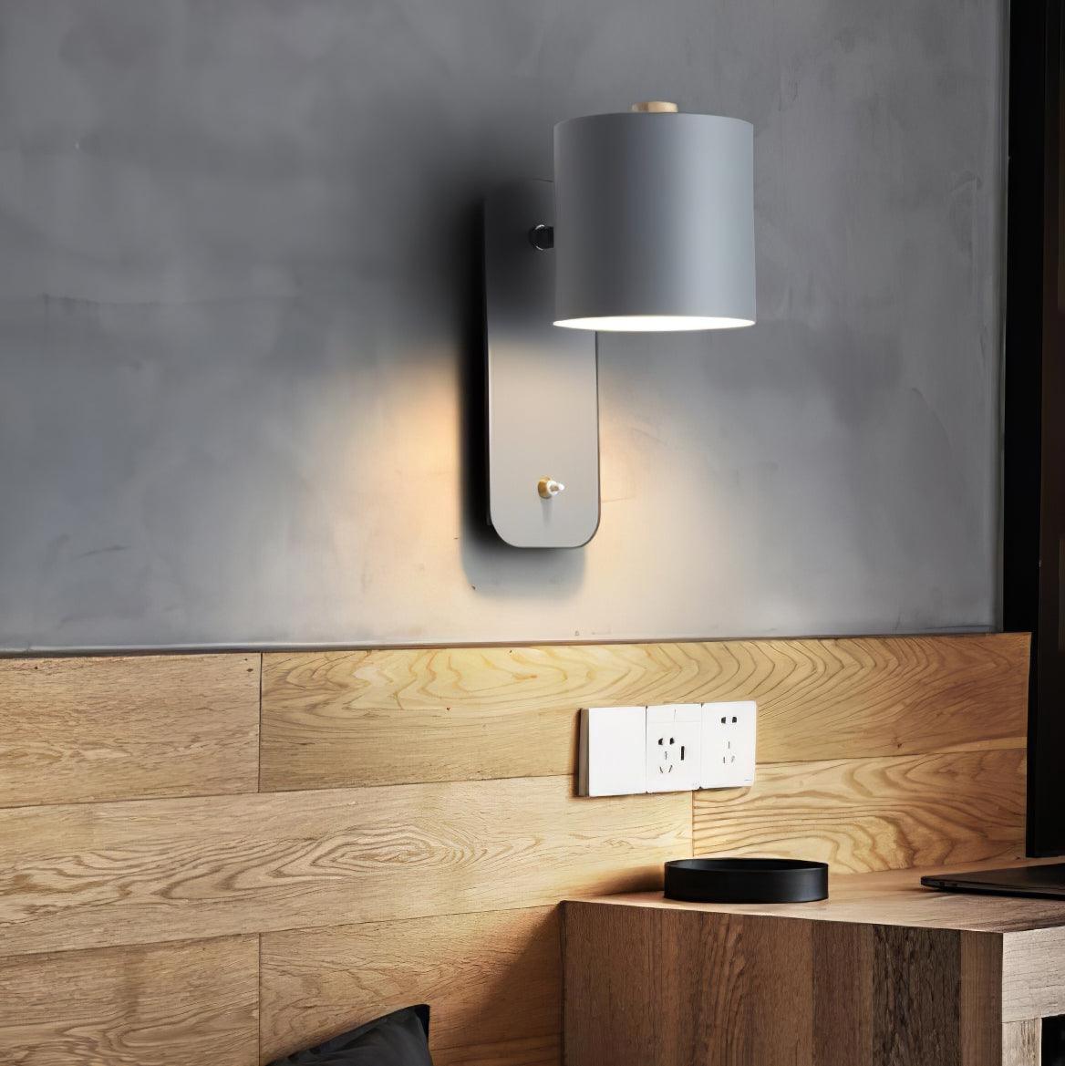 Quella regulowana lampa ścienna w kształcie cylindra