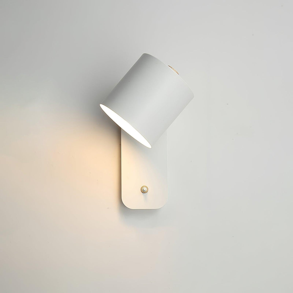 Quella regulowana lampa ścienna w kształcie cylindra