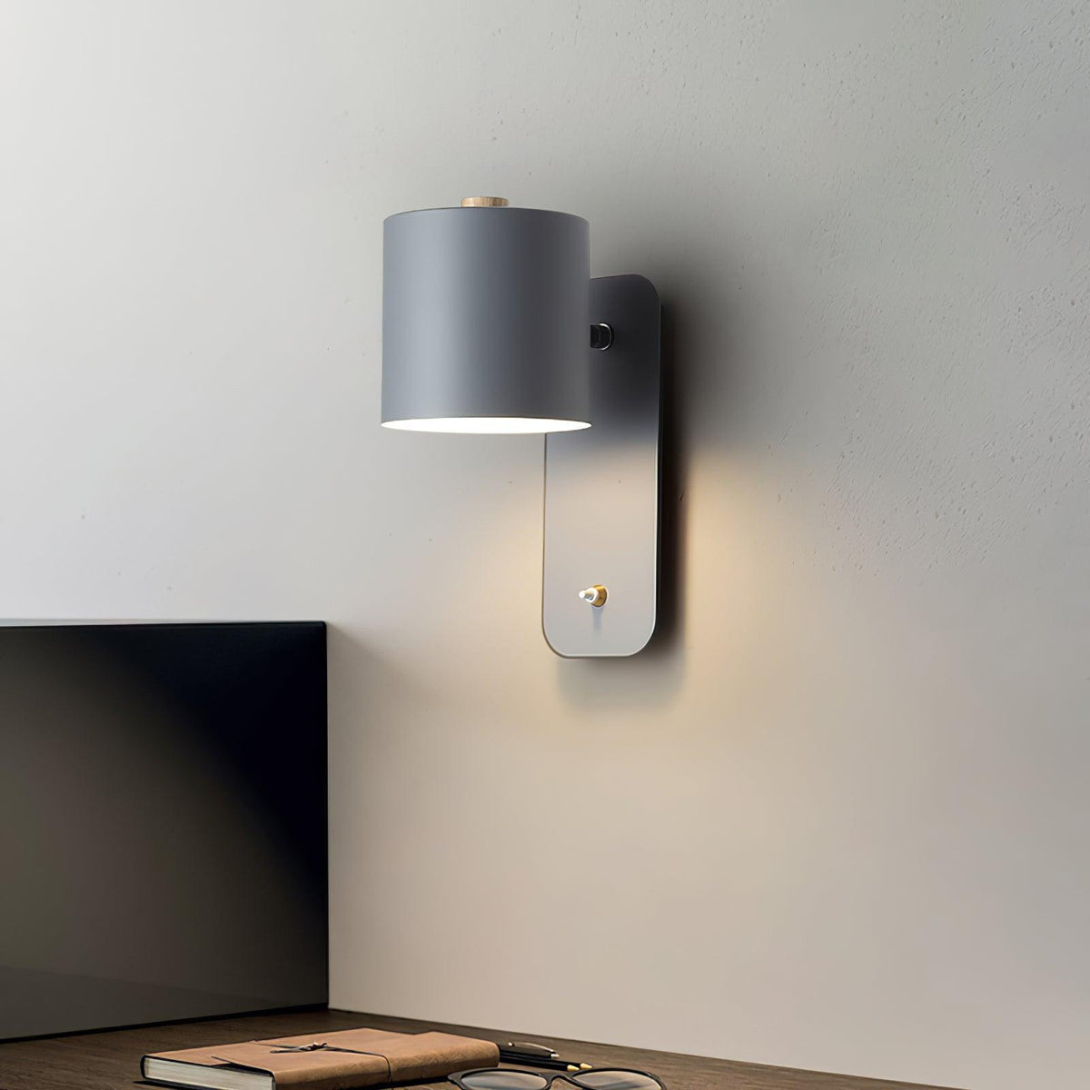 Quella regulowana lampa ścienna w kształcie cylindra