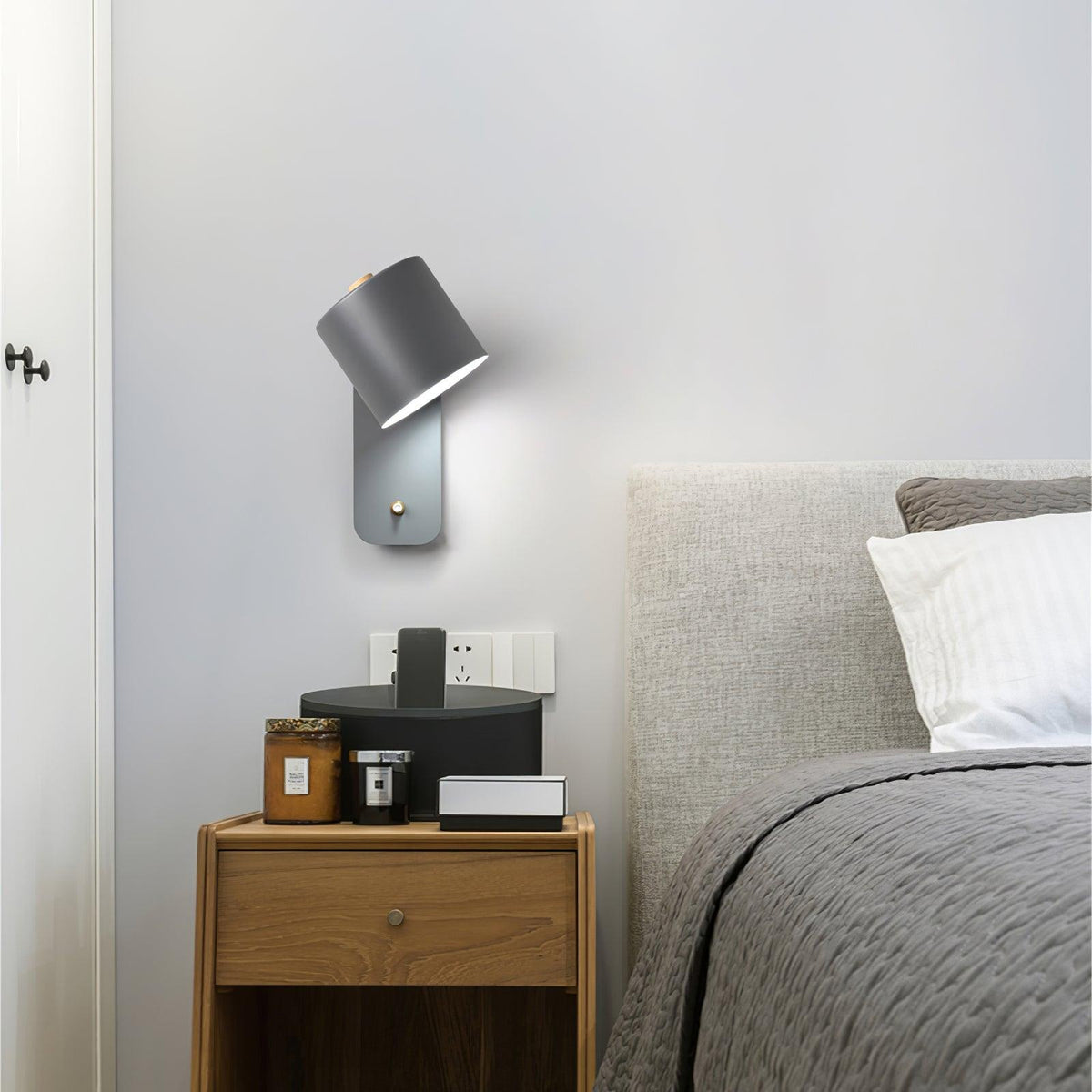 Quella regulowana lampa ścienna w kształcie cylindra