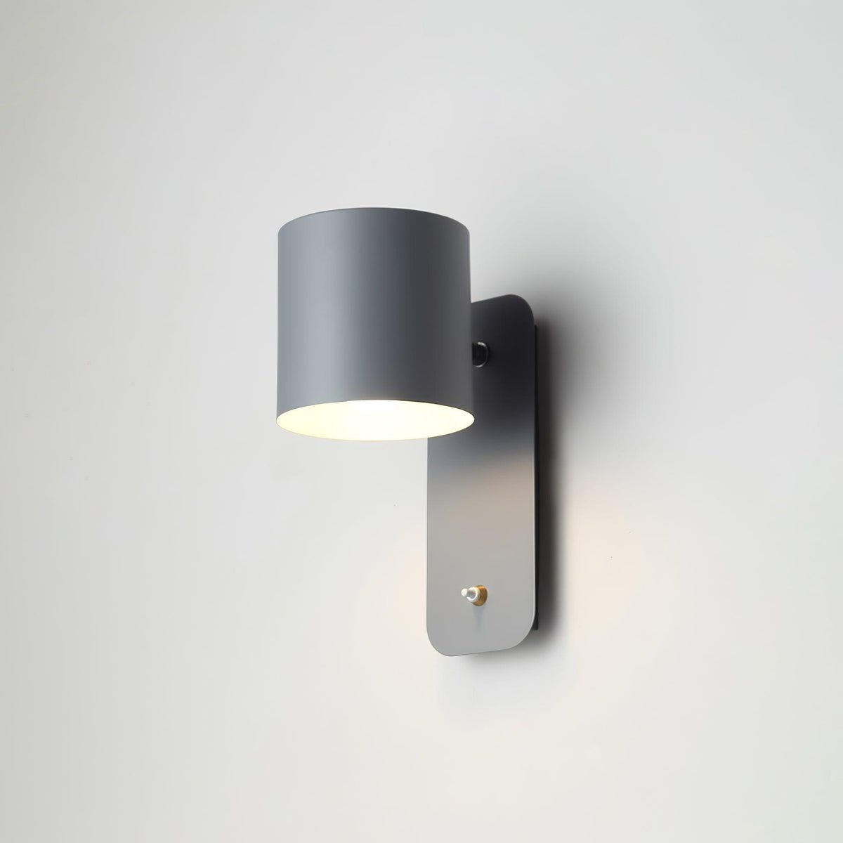 Quella regulowana lampa ścienna w kształcie cylindra
