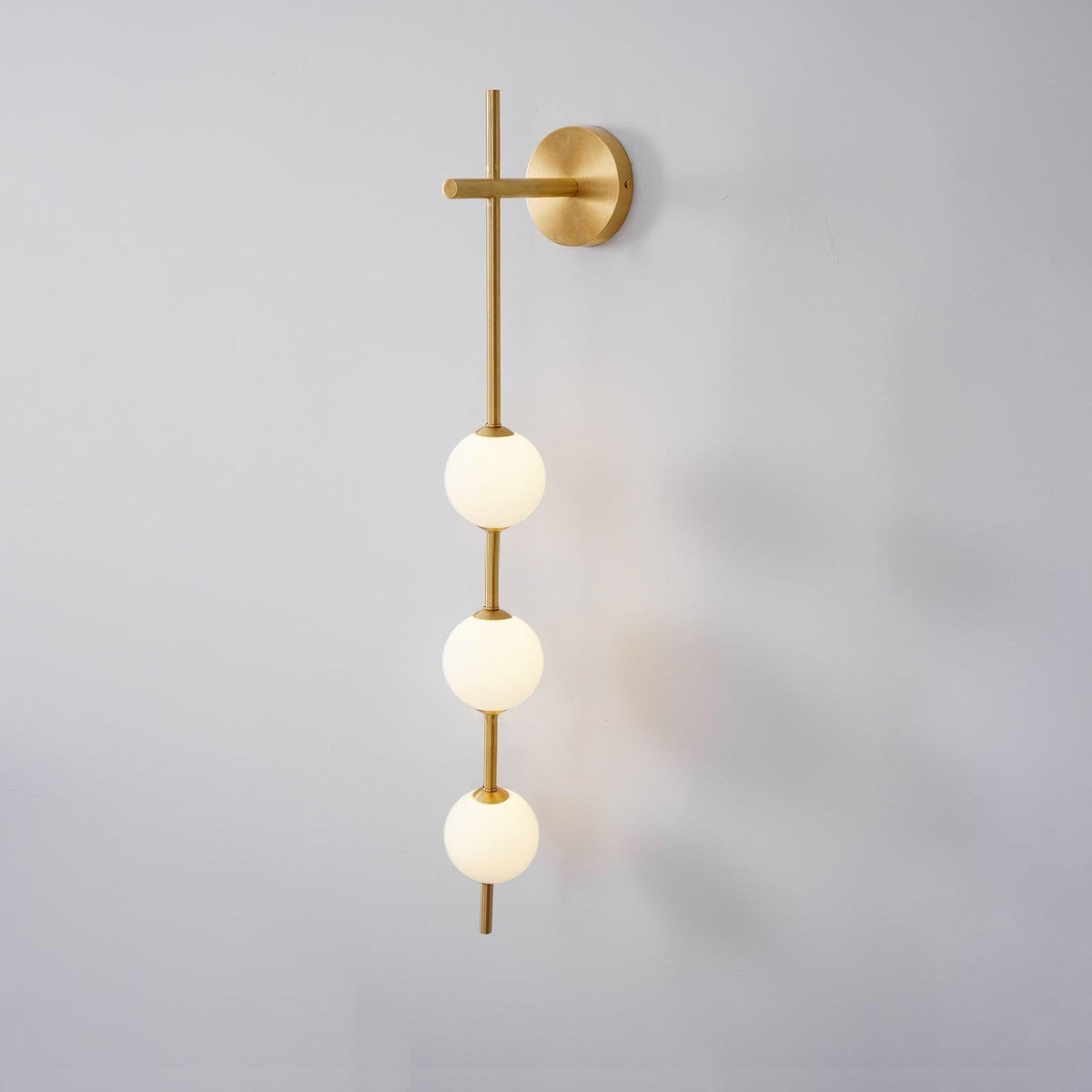Cerin kulista lampa ścienna